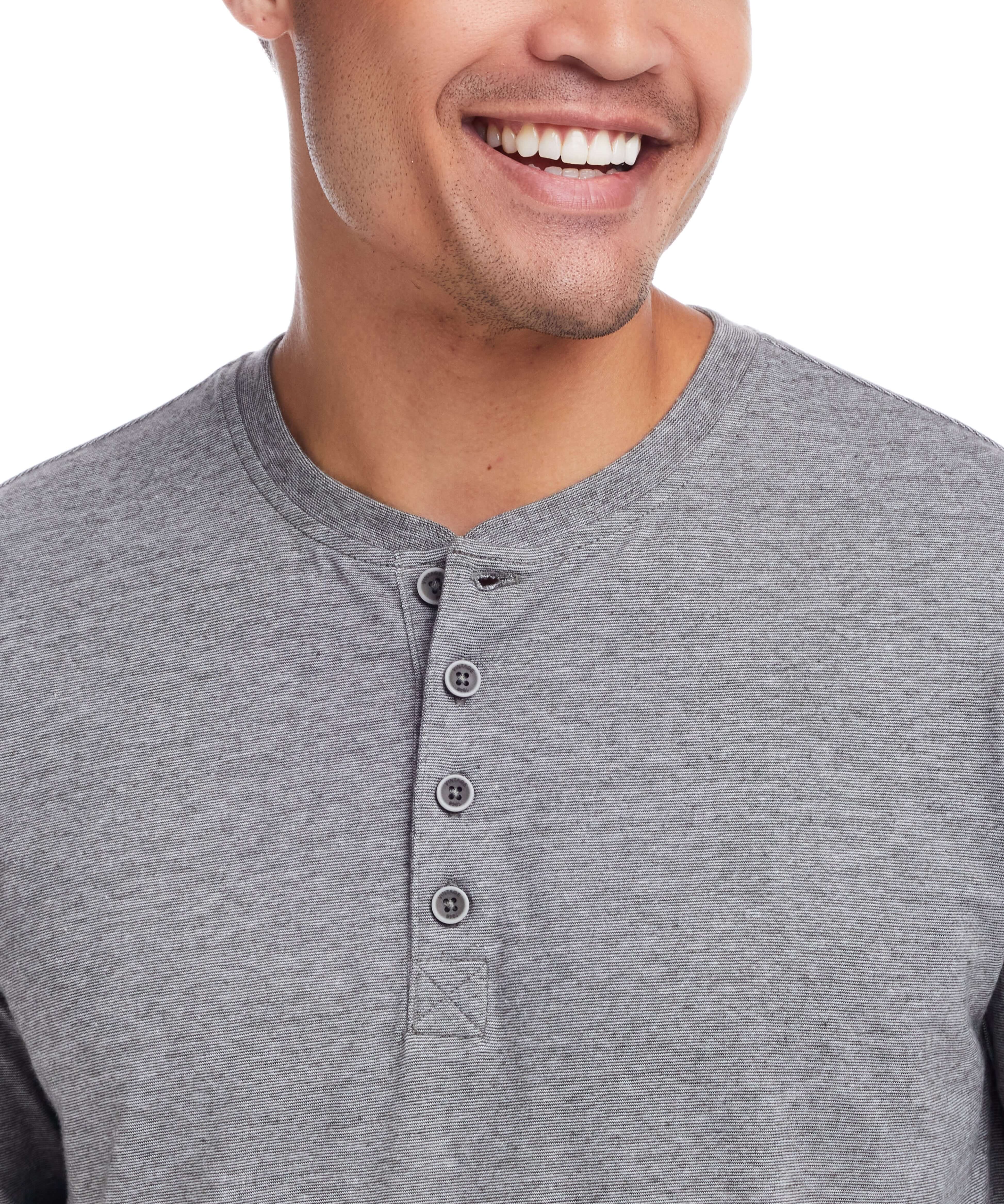 Close-up of a smiling man wearing a gray Microstripe Henley shirt with vintage detail buttons.