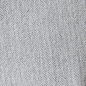 Mini Herringbone Bomber Jacket in Natural fabric close-up showcasing the subtle mini herringbone pattern.