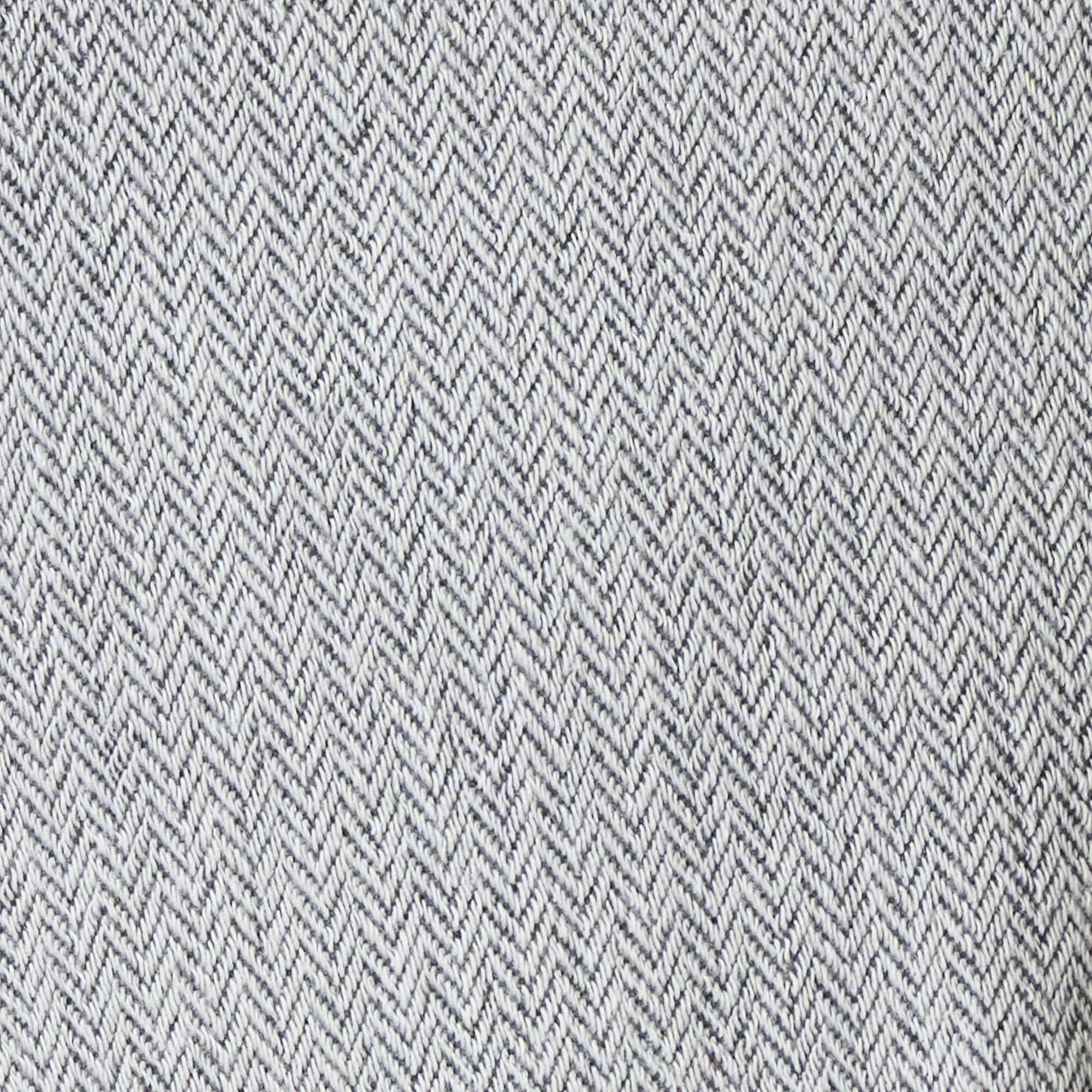 Mini Herringbone Bomber Jacket in Natural fabric close-up showcasing the subtle mini herringbone pattern.