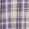 Close-up of a purple and white plaid fabric texture, showcasing intersecting lines and colors for stylish garment design.
