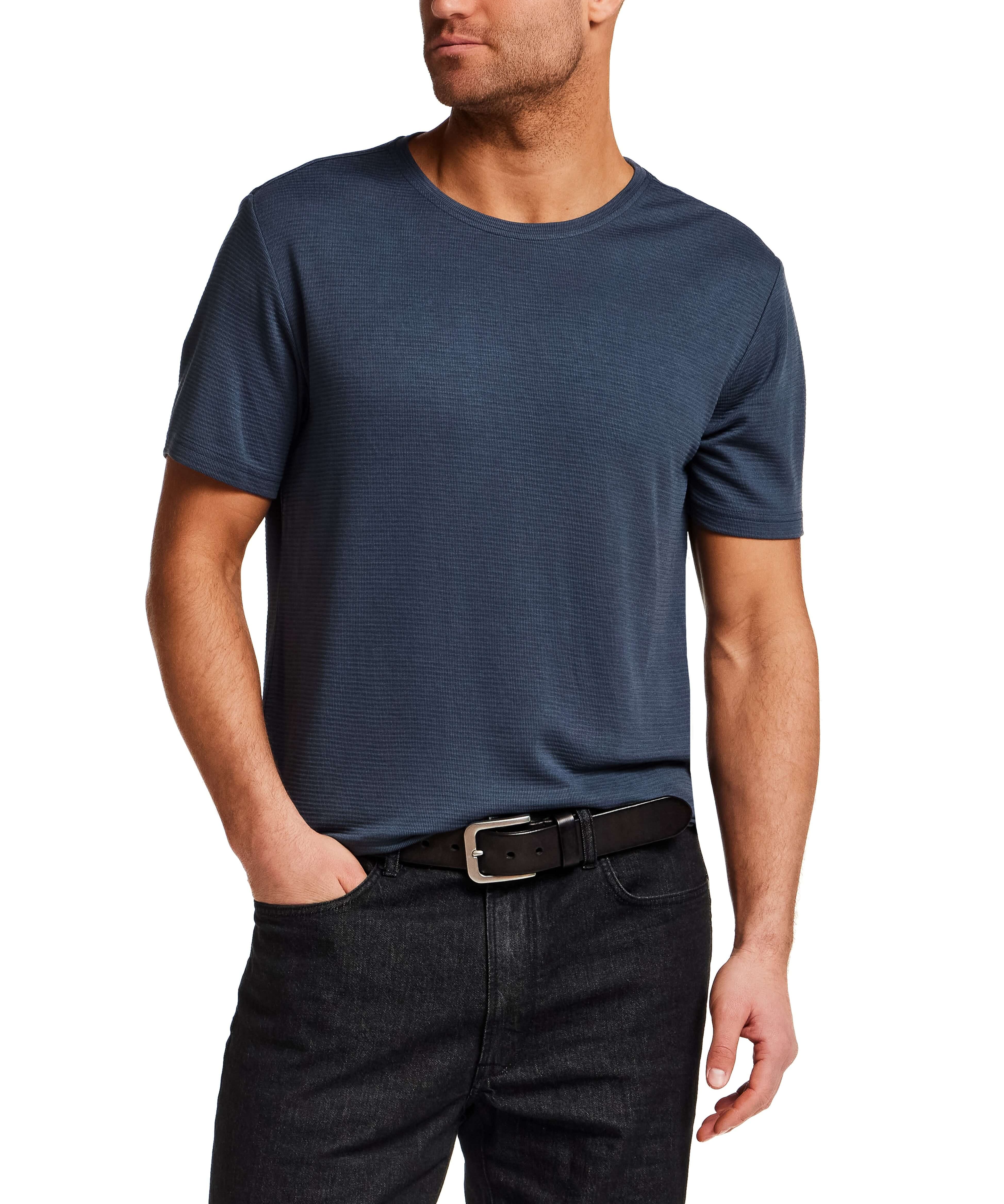 Model wearing Horizontal Rib Tee in Navy, showcasing its soft modal blend and subtle horizontal ribbing.