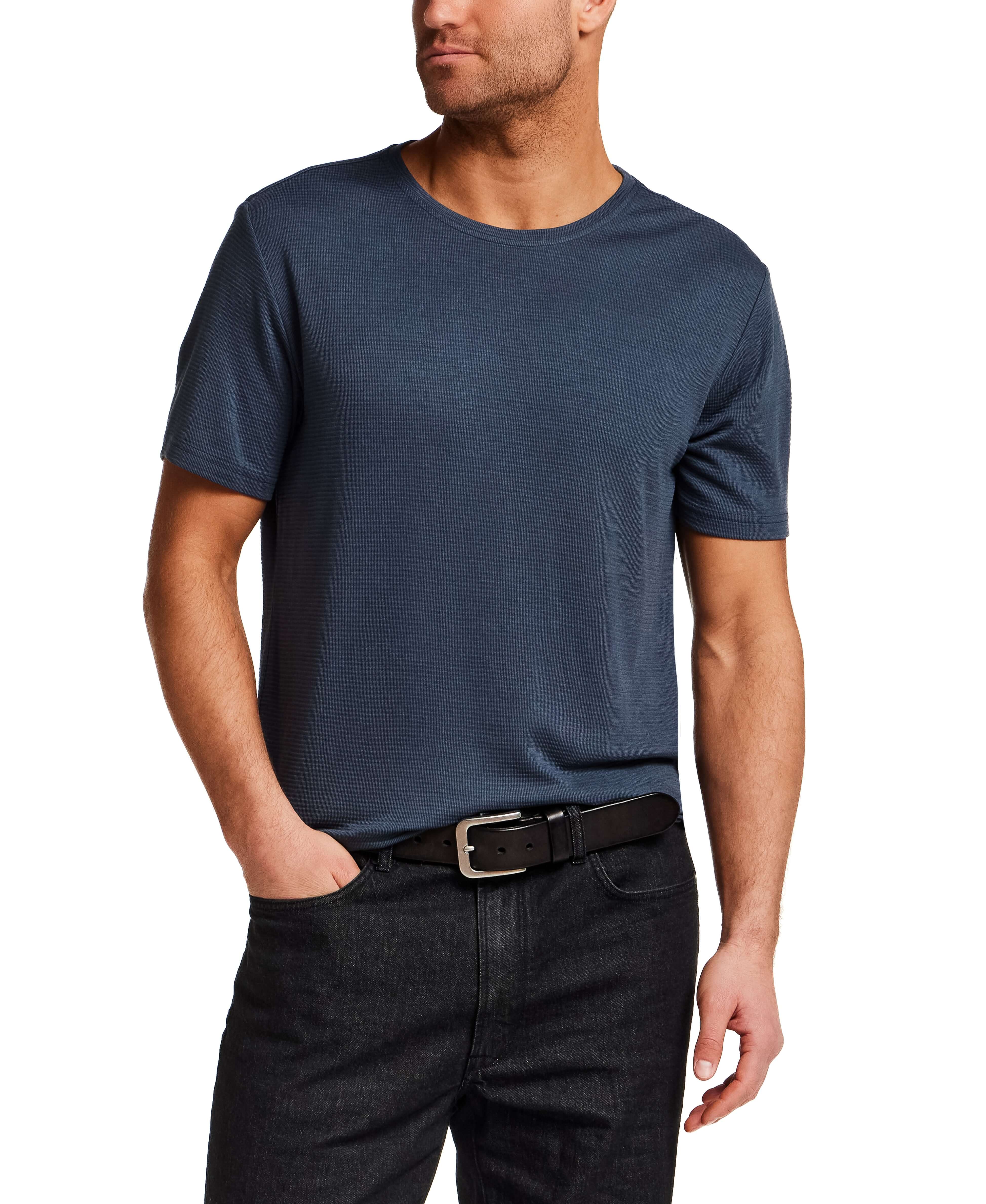 Model wearing Horizontal Rib Tee in Navy, showcasing its soft modal blend and subtle horizontal ribbing.