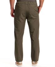 The Tech Jogger in Olive, featuring an elastic waistband and tailored leg for a refined profile.