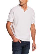 Open Collar Polo Sweater in Bleached White worn by a model with a confident pose.