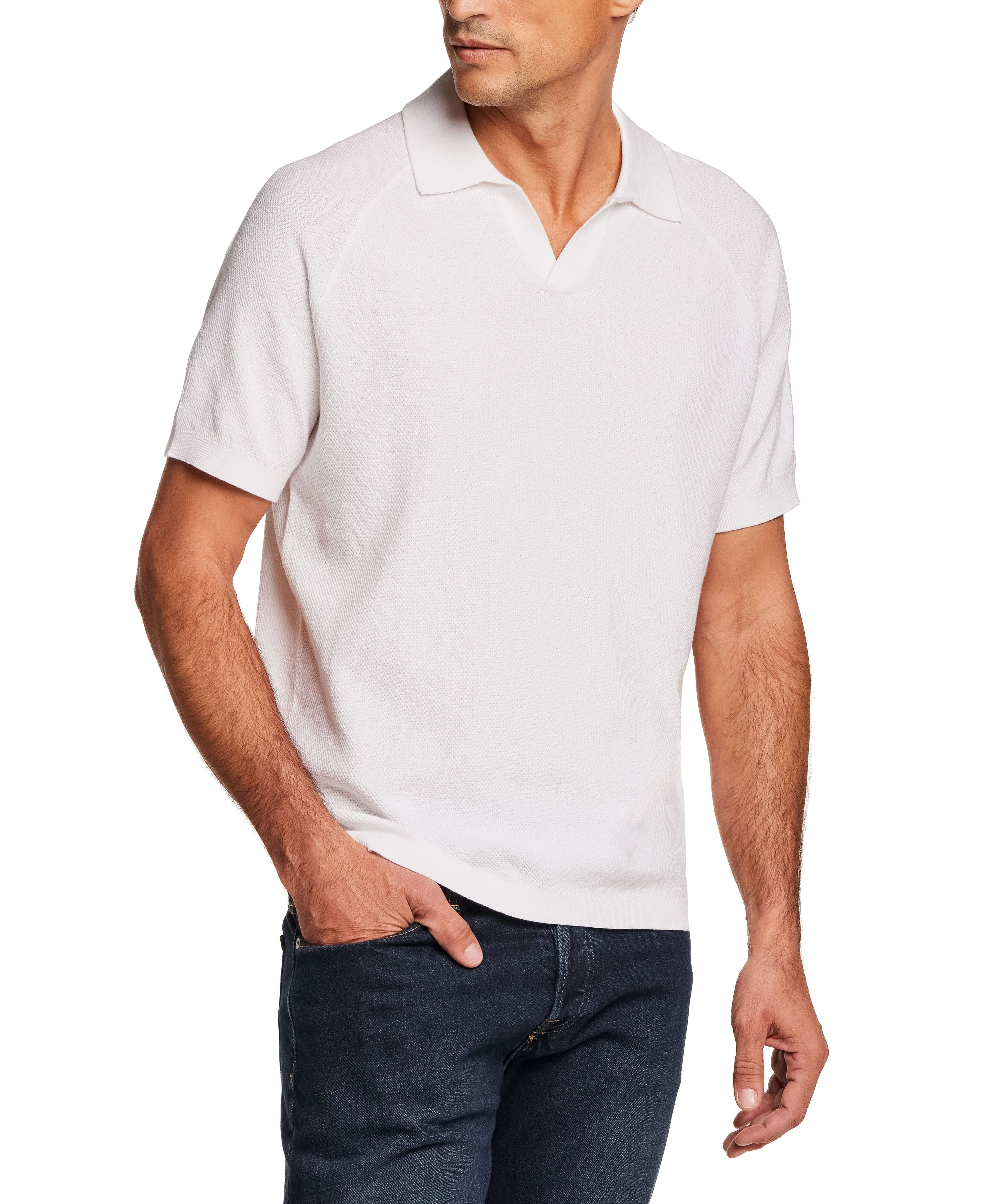 Open Collar Polo Sweater in Bleached White worn by a model with a confident pose.