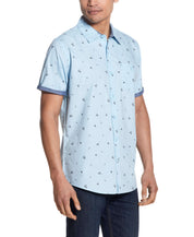 Peached Poplin Mini Print In Soft Blue shirt with short sleeves and front pocket, model wearing, summer fashion.
