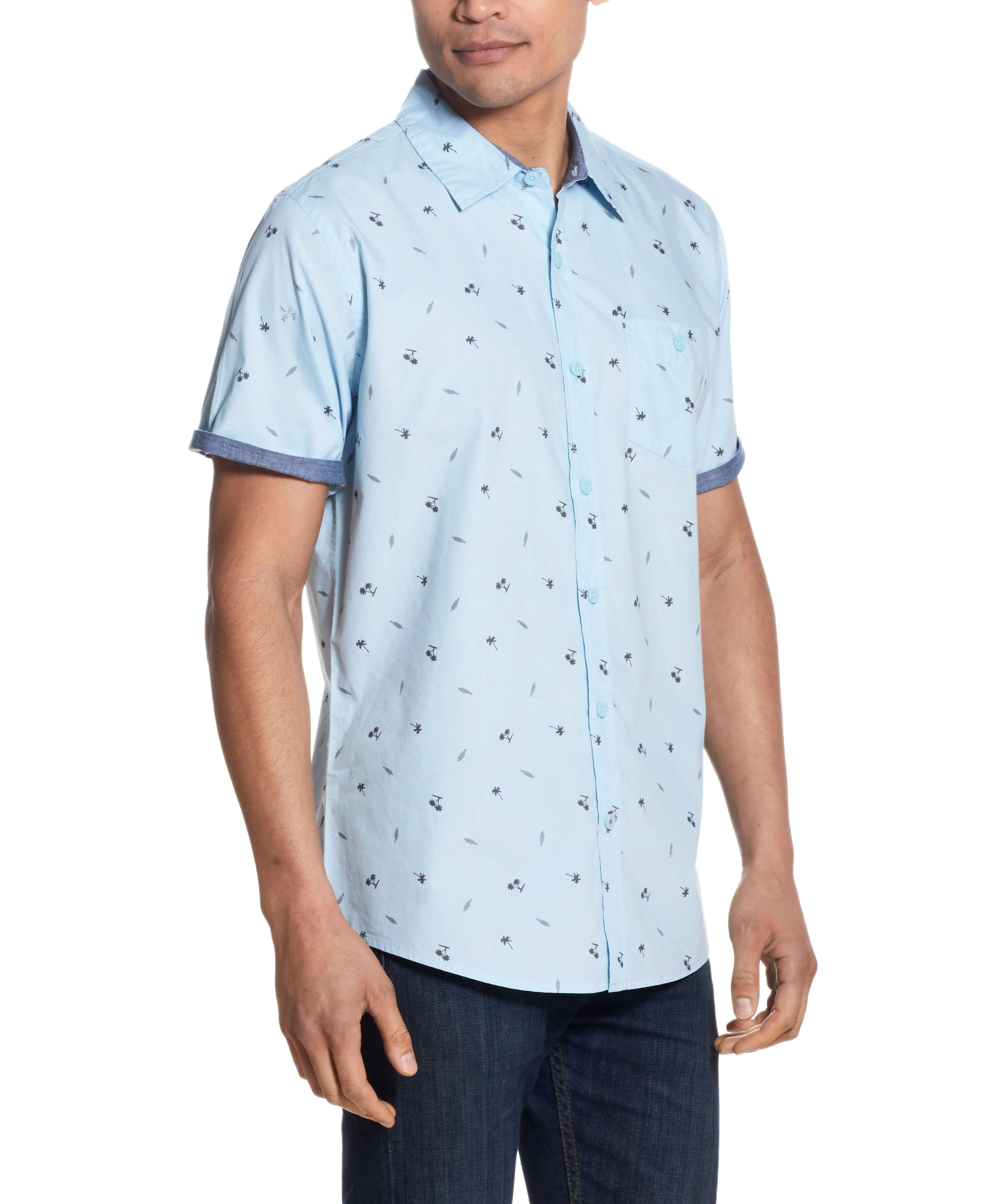 Peached Poplin Mini Print In Soft Blue shirt with short sleeves and front pocket, model wearing, summer fashion.