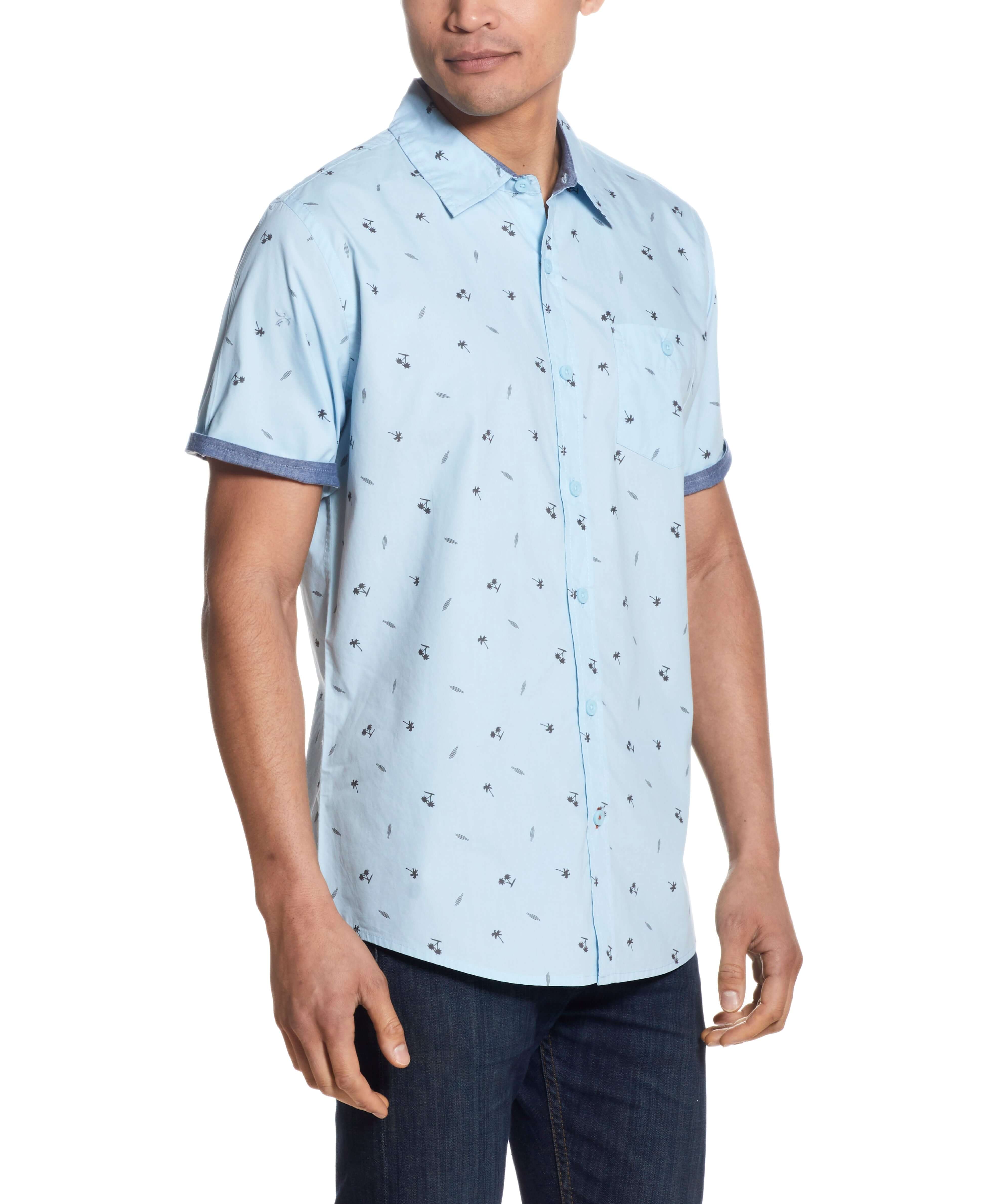 Peached Poplin Mini Print In Soft Blue shirt with short sleeves and front pocket, model wearing, summer fashion.