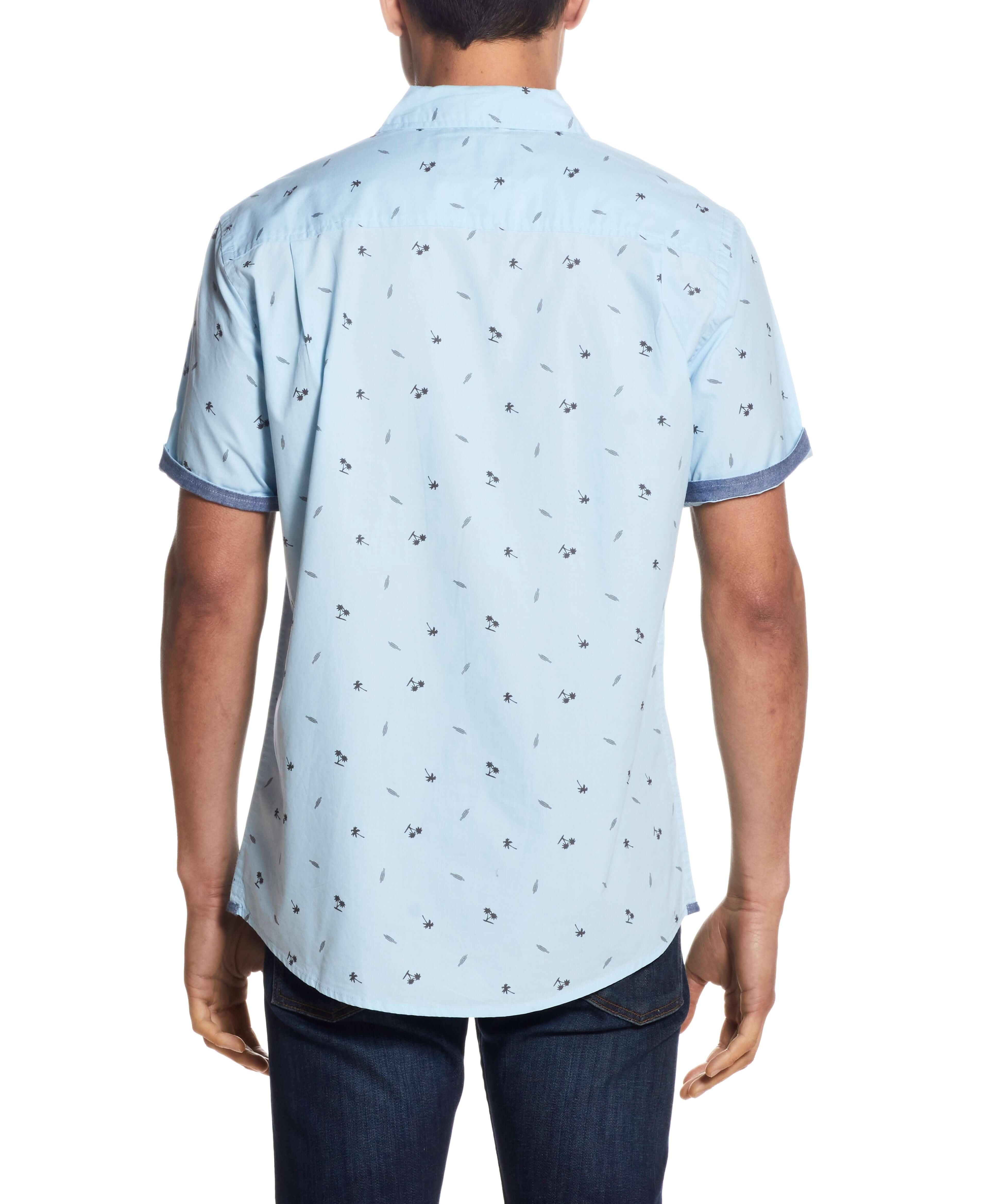 Back view of a man wearing a Peached Poplin Mini Print In Soft Blue shirt with short sleeves.