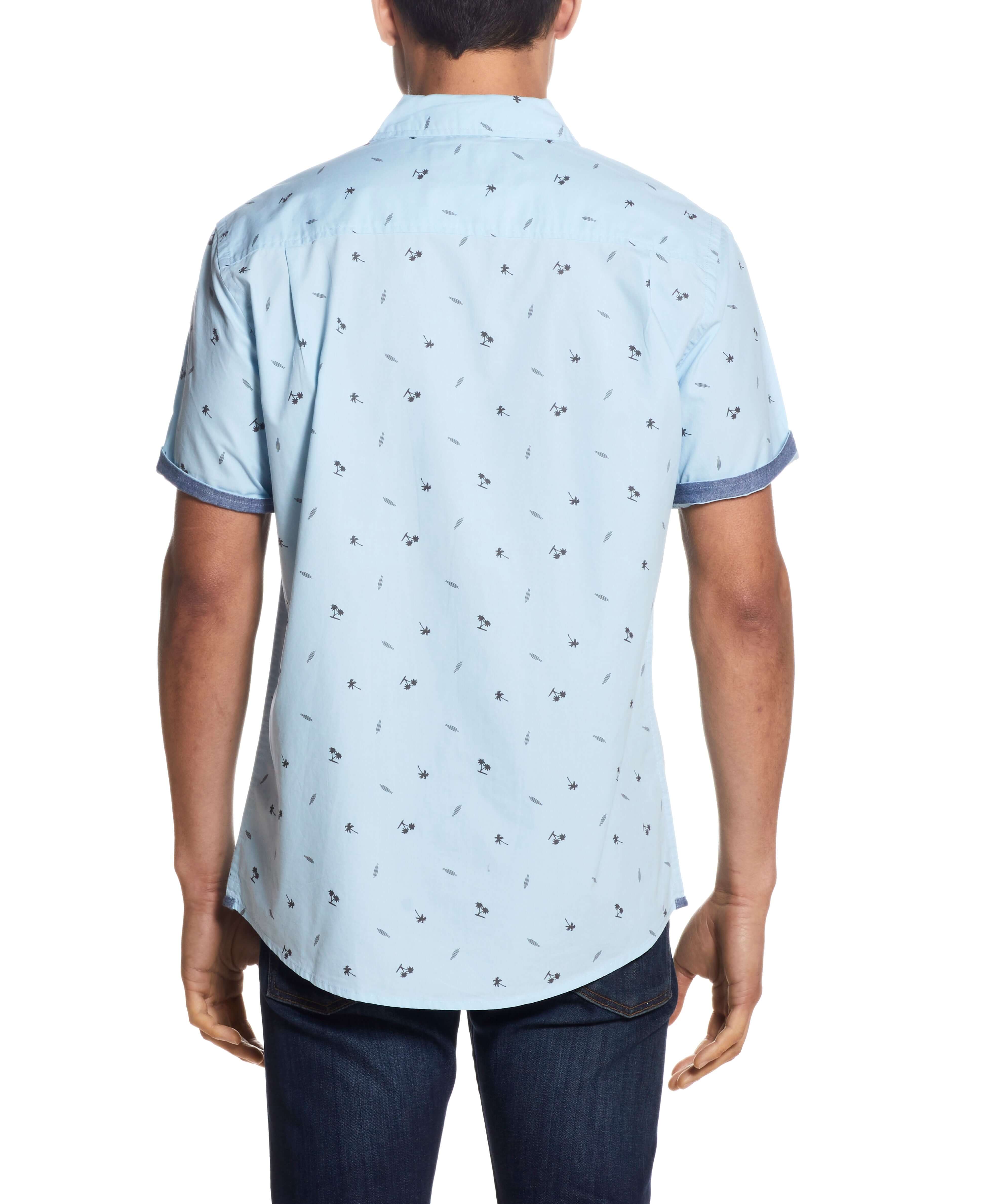Back view of a man wearing a Peached Poplin Mini Print In Soft Blue shirt with short sleeves.