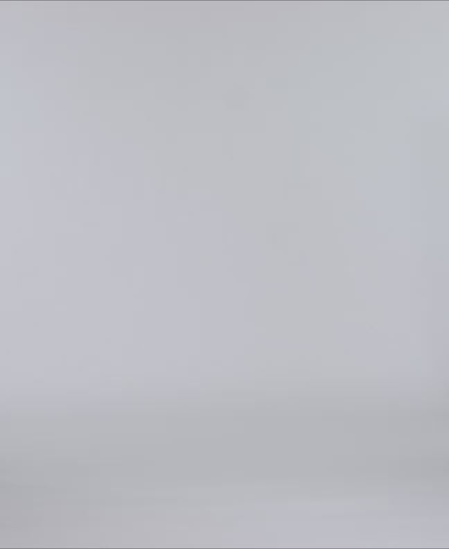 Short Sleeve Stripe Linen Cotton Shirt In Peach Echo displayed on a minimalist background, highlighting its relaxed fit and button-down design.