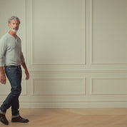 Model wearing Long Sleeve Crinkle Henley in Grey Heather, showcasing a stylish pullover look with long sleeves.