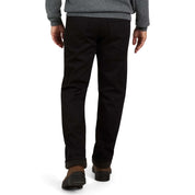 Man in regular fit fleece lined jeans in jet black, showcasing a cozy, stylish look for fall and winter comfort.
