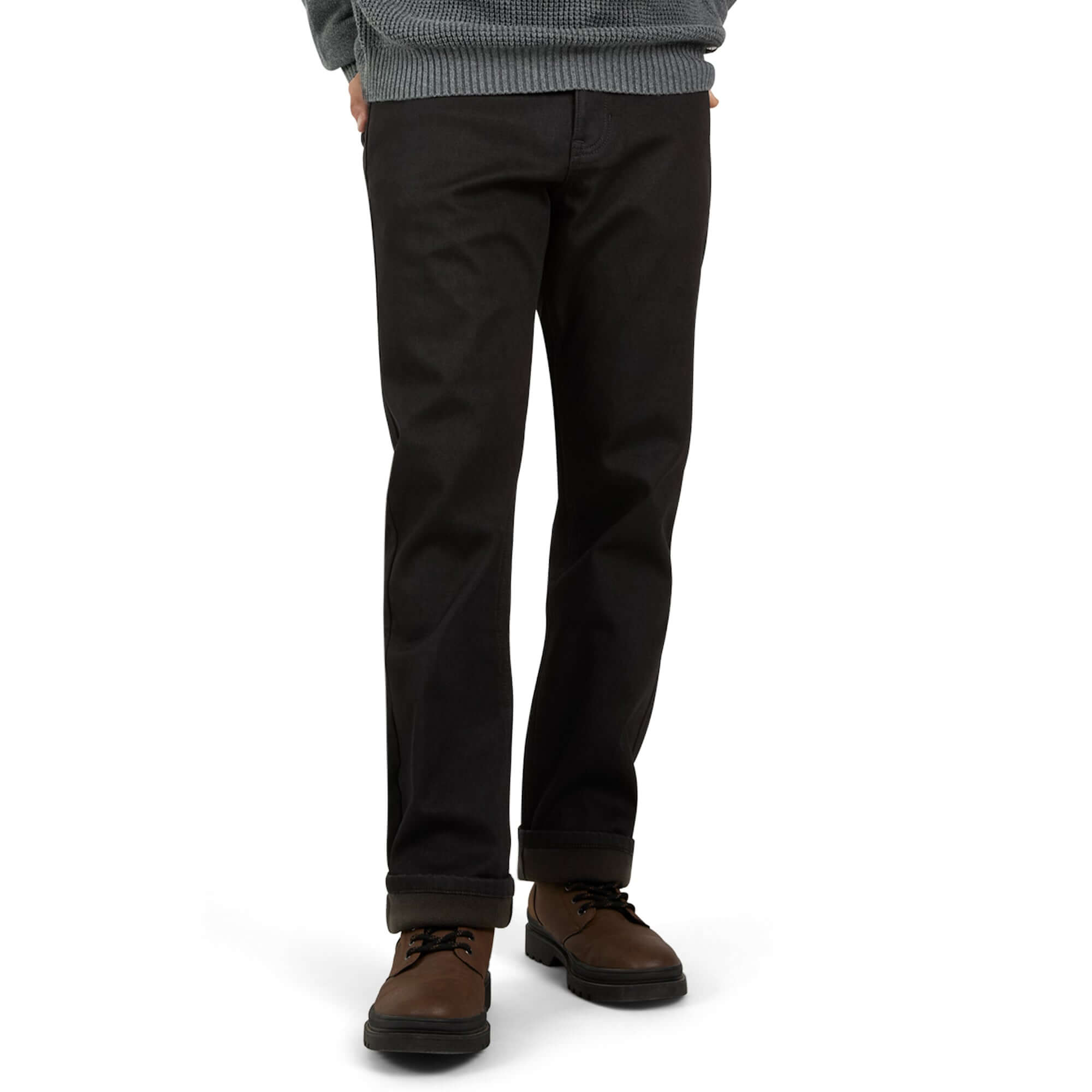 Regular fit fleece lined jeans in jet black, ideal for winter comfort and style, paired with brown shoes.