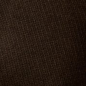Close-up of ribbed texture in a rich brown hue, showcasing the soft fabric of the Ribbed Quarter Zip in Brown.