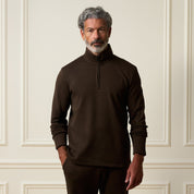 Ribbed Quarter Zip in Brown worn by a man, featuring a quarter-zip neckline and long sleeves.