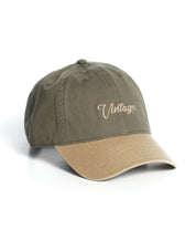 Script Vintage Hat in Olive, adjustable one size fits all, perfect for fashion-forward outdoor style.
