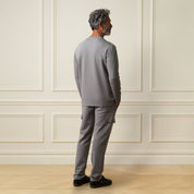 Scuba Cargo Jogger in Grey worn by a man from the back, showcasing its soft fabric and modern design.