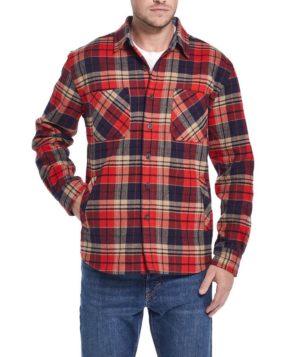 Stylish man wearing a red and navy plaid flannel shirt jacket with chest pockets, perfect for casual outfits.