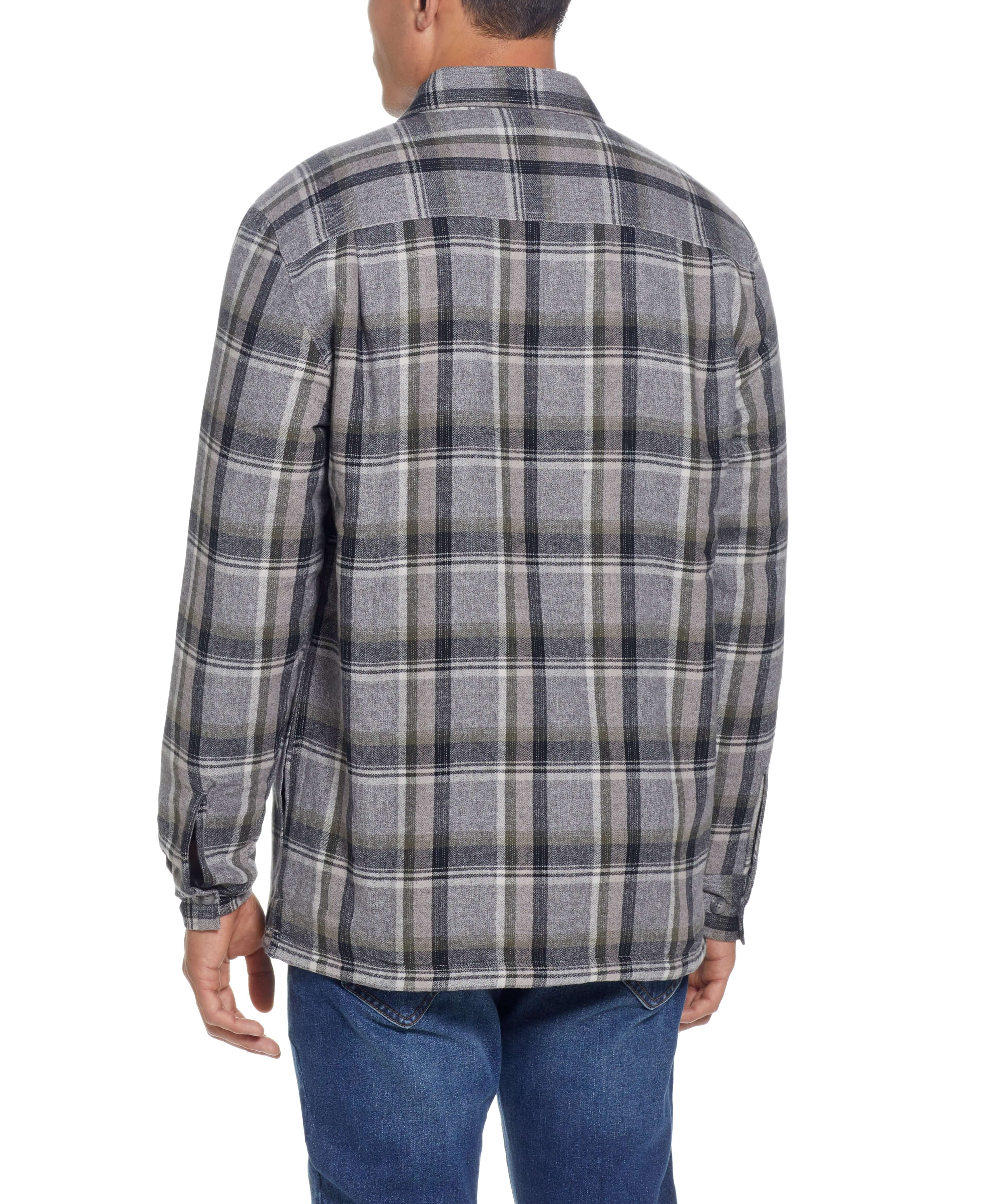Back view of a man wearing a twine sherpa lined flannel shirt jacket, featuring a classic plaid pattern and relaxed fit.