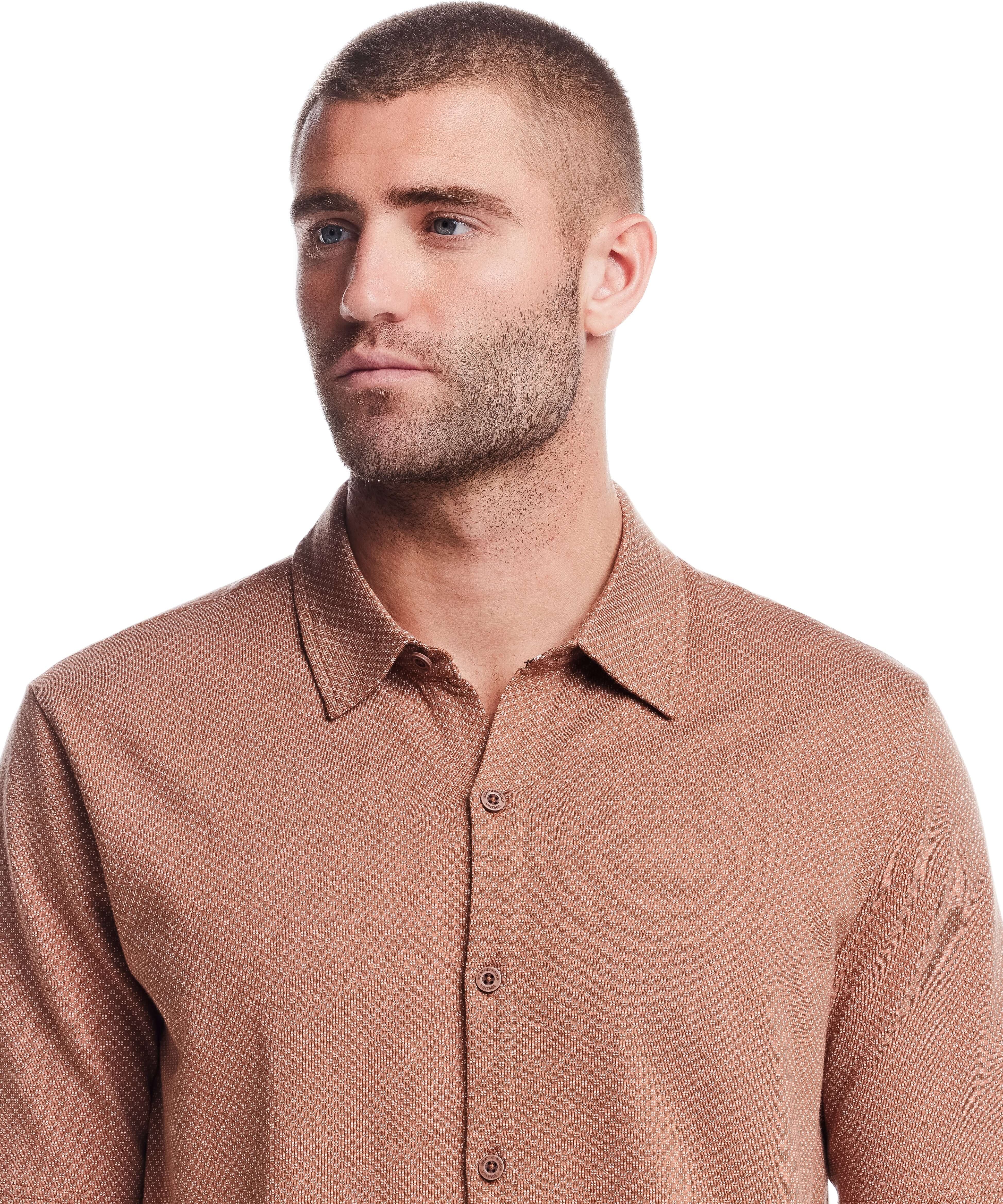 Short sleeve button front knit coat in biscuit color with mini jacquard checkerboard pattern on model.