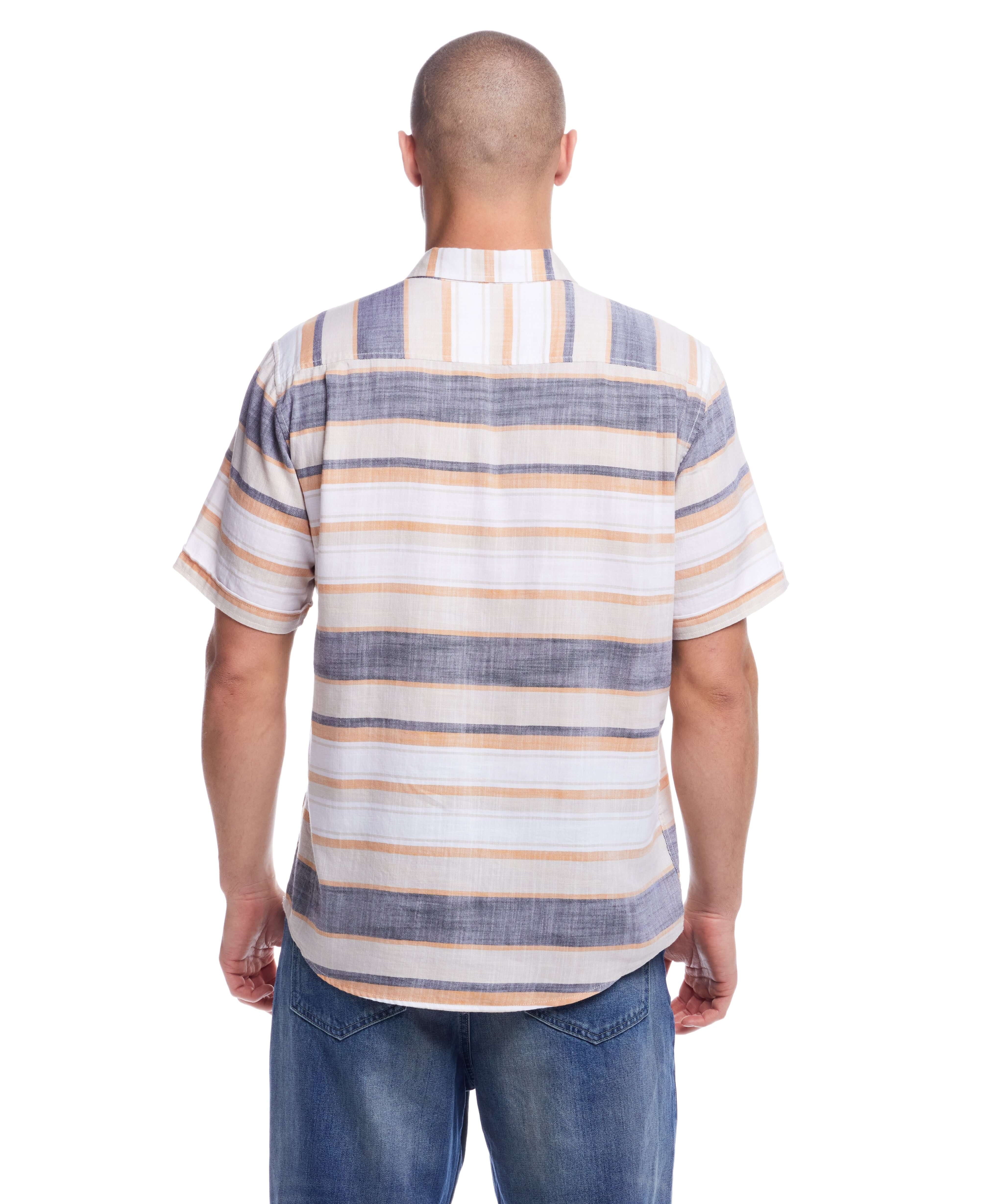 Model wearing the back view of a Short Sleeve Country Twill Stripe Shirt in Wheat, showcasing its classic striped design.