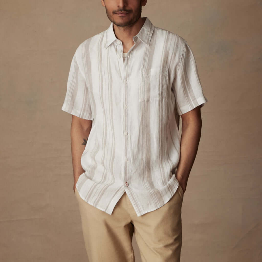 Short sleeve faux linen cotton shirt in natural stripe, featuring a button down collar and chest pocket.