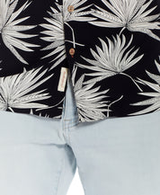 Short Sleeve Rayon Print Camp Collar In Sky Captain featuring a vibrant palm leaf pattern, showcasing the soft fabric and button details.