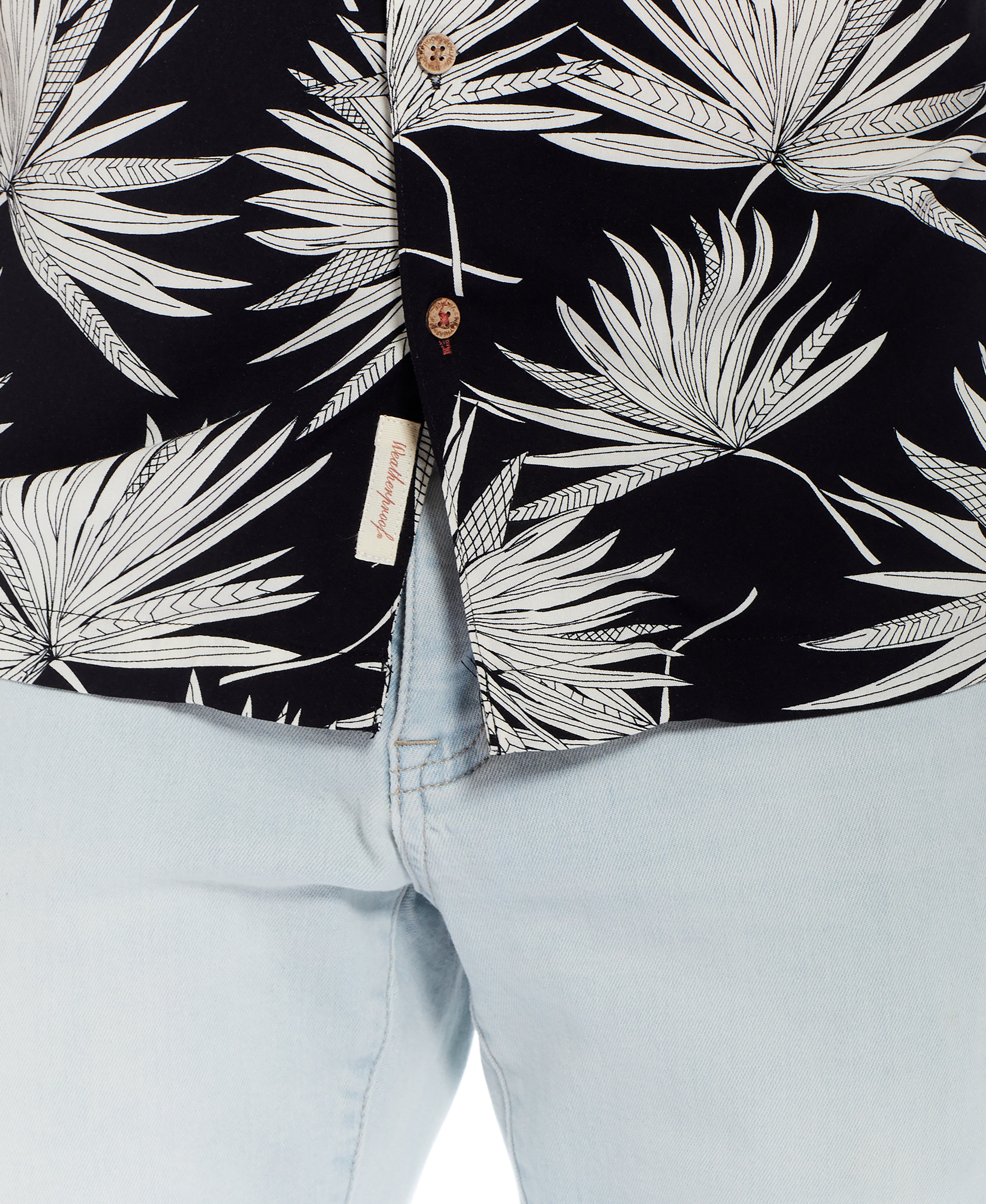 Short Sleeve Rayon Print Camp Collar In Sky Captain featuring a vibrant palm leaf pattern, showcasing the soft fabric and button details.