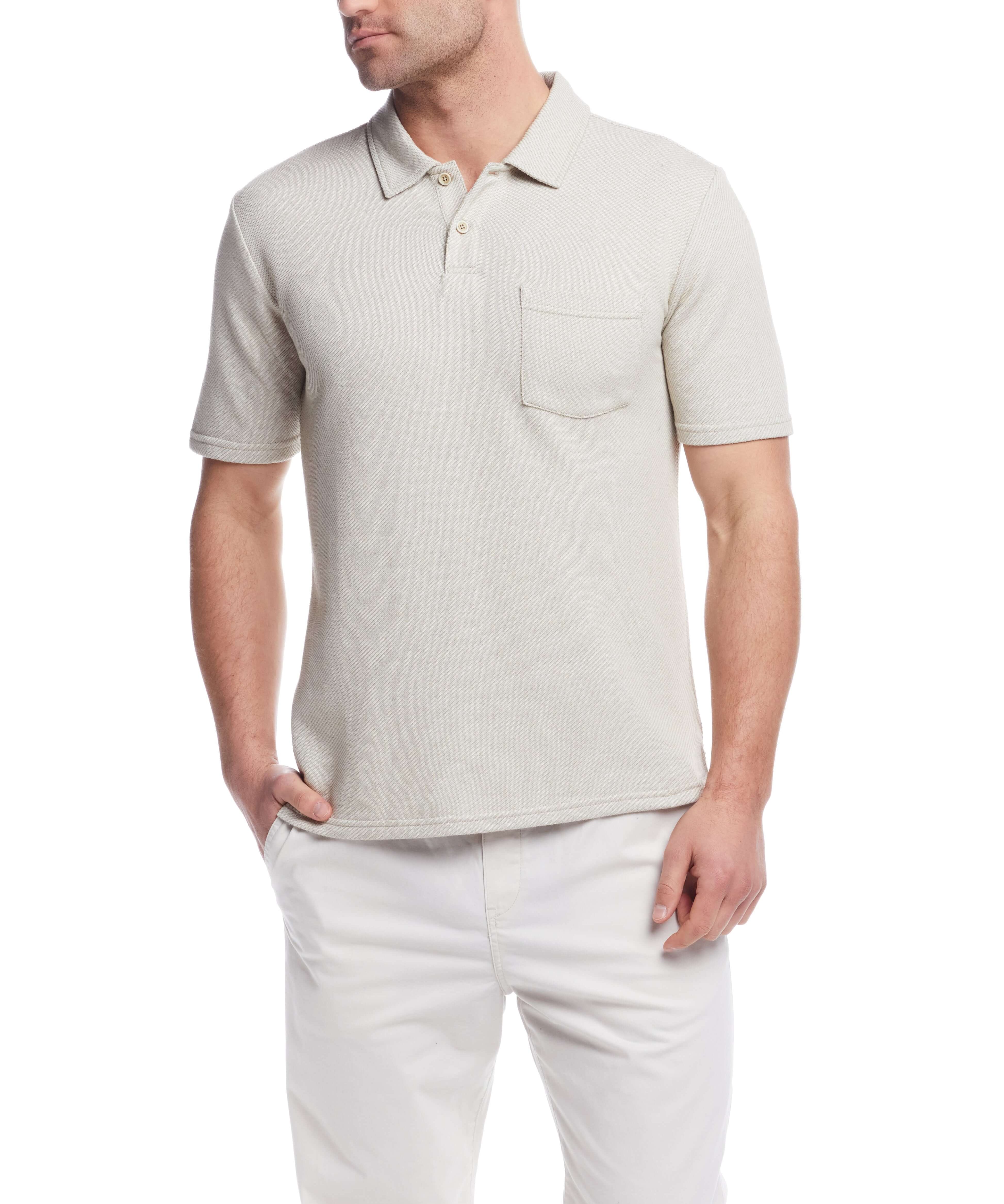 Short Sleeve Twill Polo in Natural, featuring a classic design with chest pocket and two-button placket, model wearing size Large.