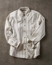 Long sleeve ecru textured shirt featuring subtle stripes, button-down collar, and chest pocket.