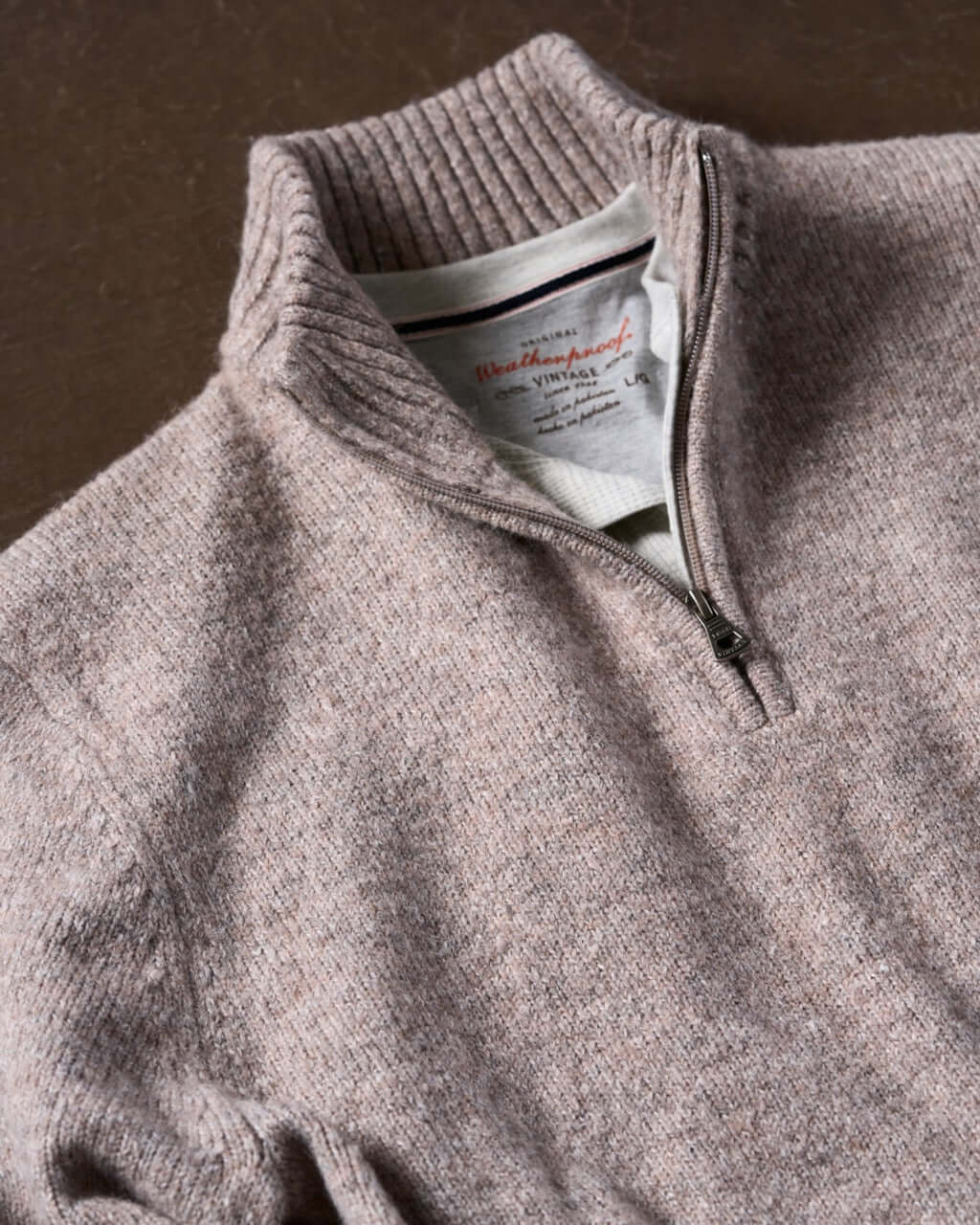 Fuzzy taupe quarter zip sweater featuring a classic mock neck and ribbed cuffs, perfect for cozy layering on cooler days.