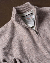 Fuzzy taupe quarter zip sweater featuring a classic mock neck and ribbed cuffs, perfect for cozy layering on cooler days.