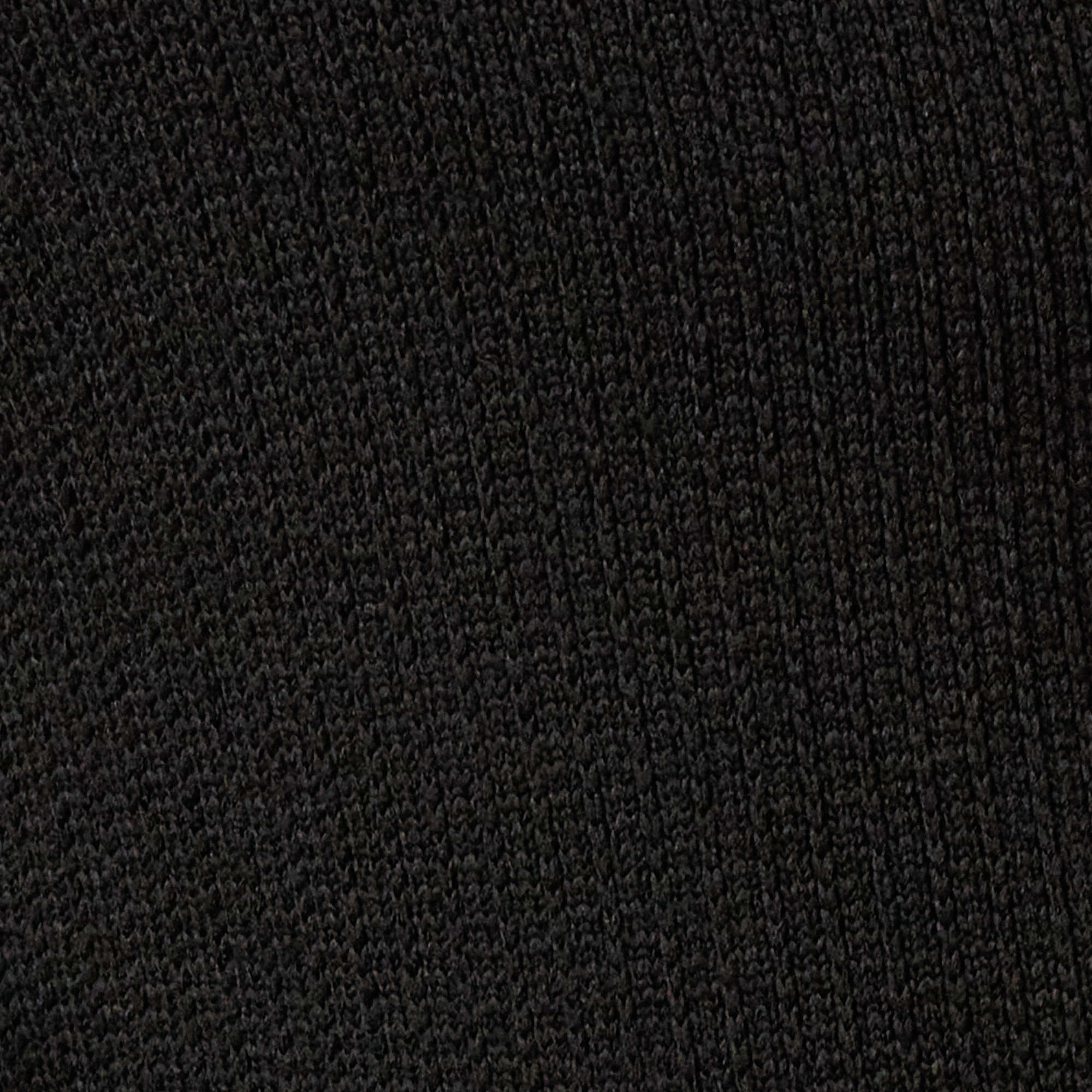 Close-up of the ribbed texture of the Ribbed Bomber Jacket in Black, showcasing its soft fabric.