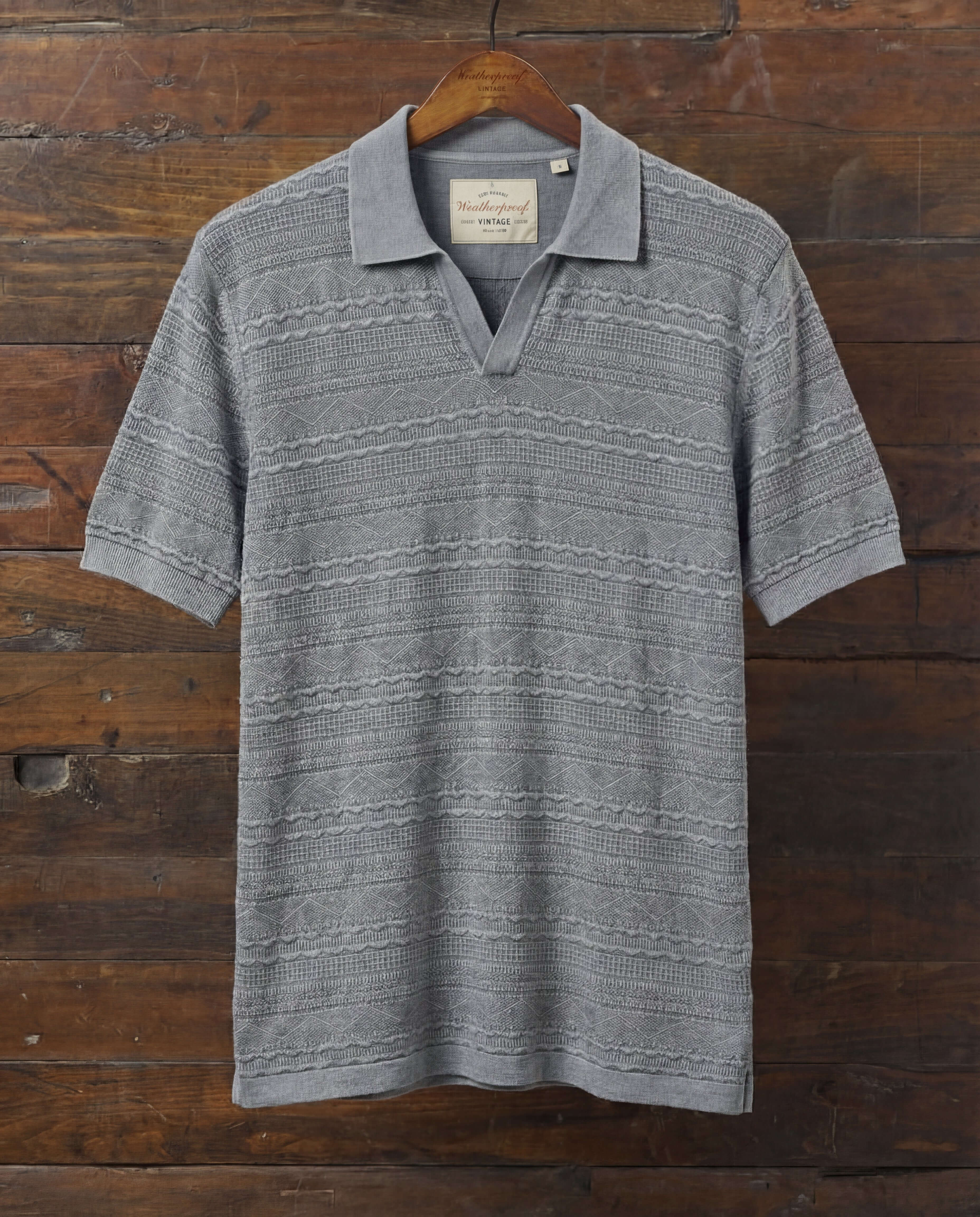 Stonewash Knit Johnny Collar Polo in Flint displayed on a wooden hanger against a rustic background.