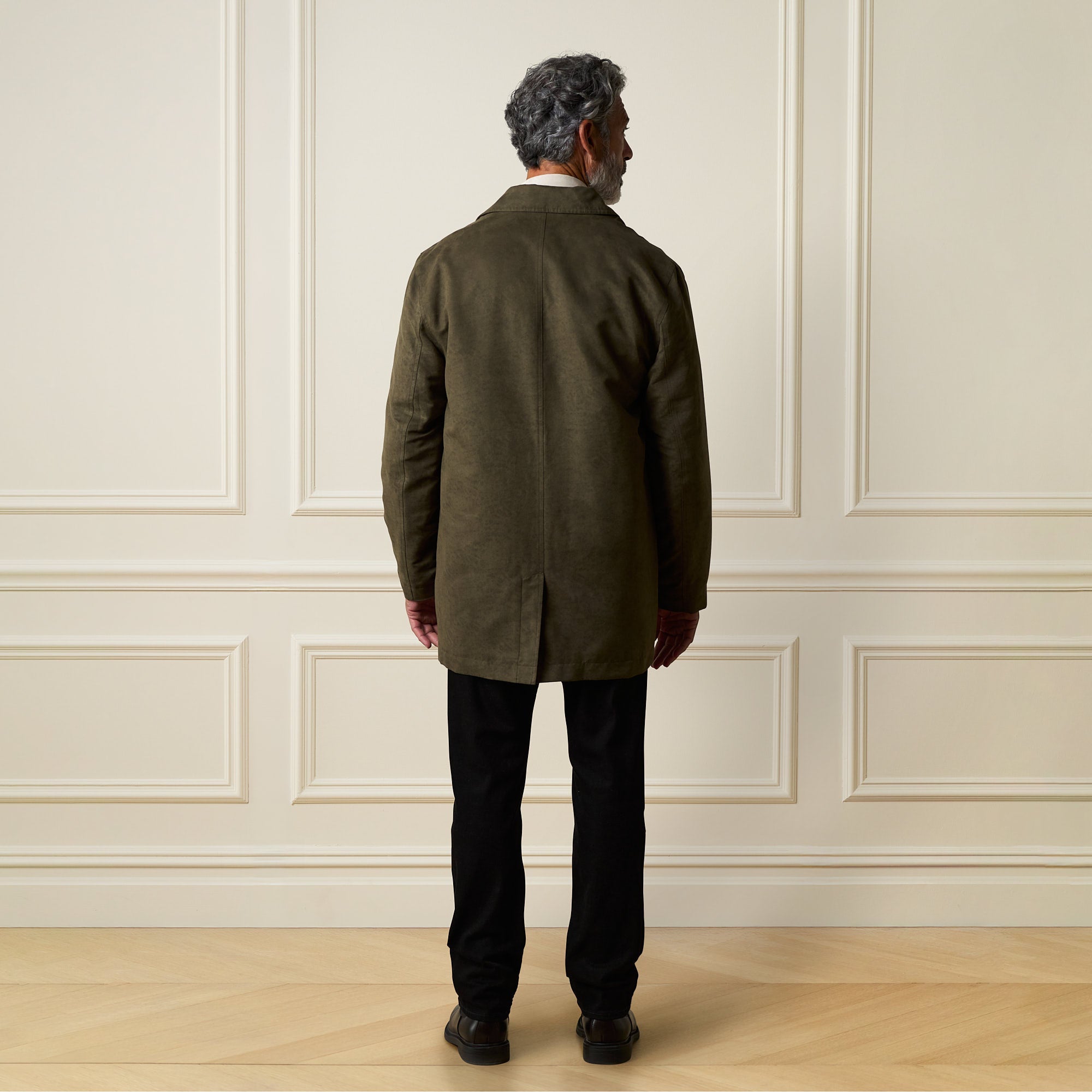 Sueded Jacket in Olive worn by a model, showcasing the back view and stylish design.
