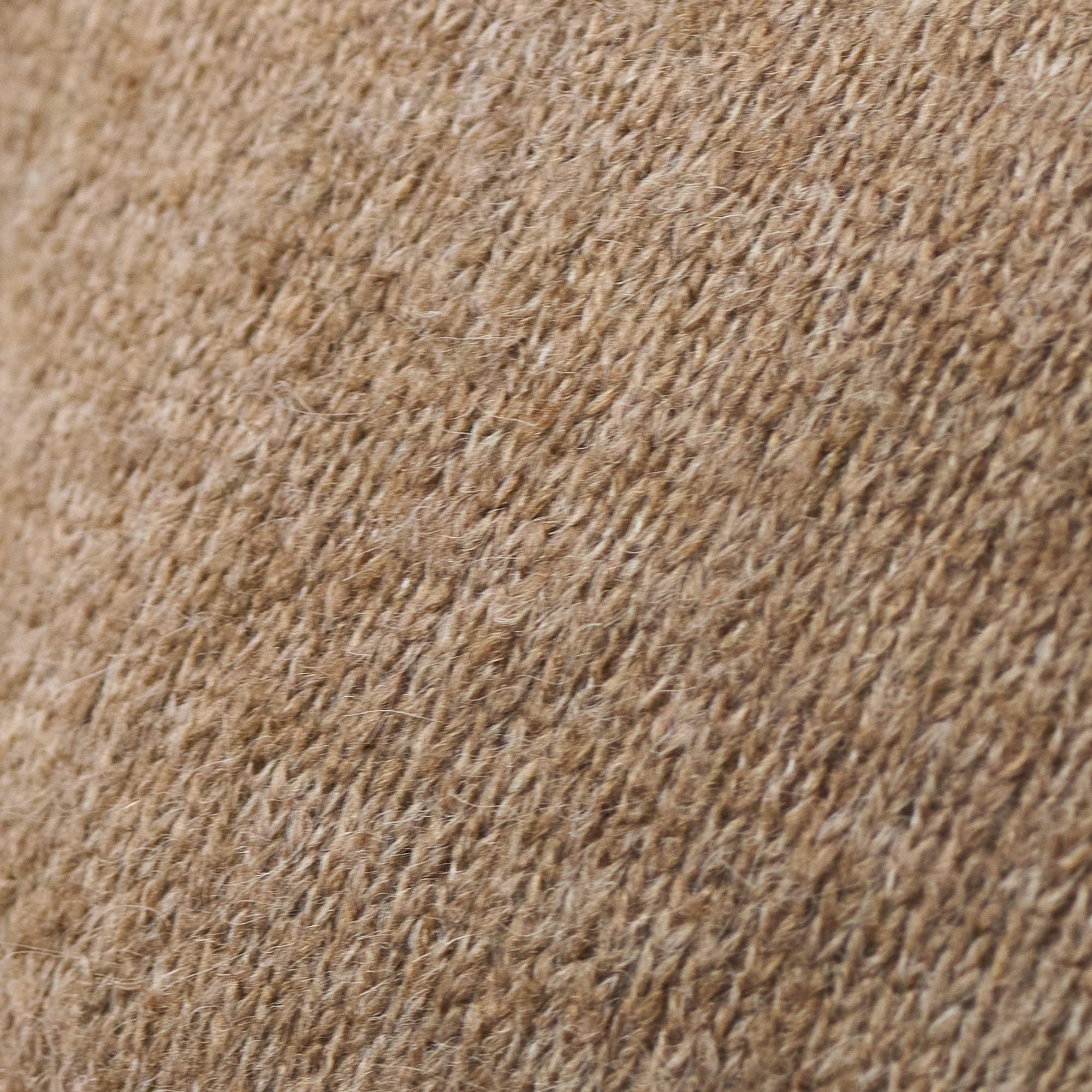 Close-up view of the soft sweater knit fabric used in the Sweater Knit Hoodie in Brown.