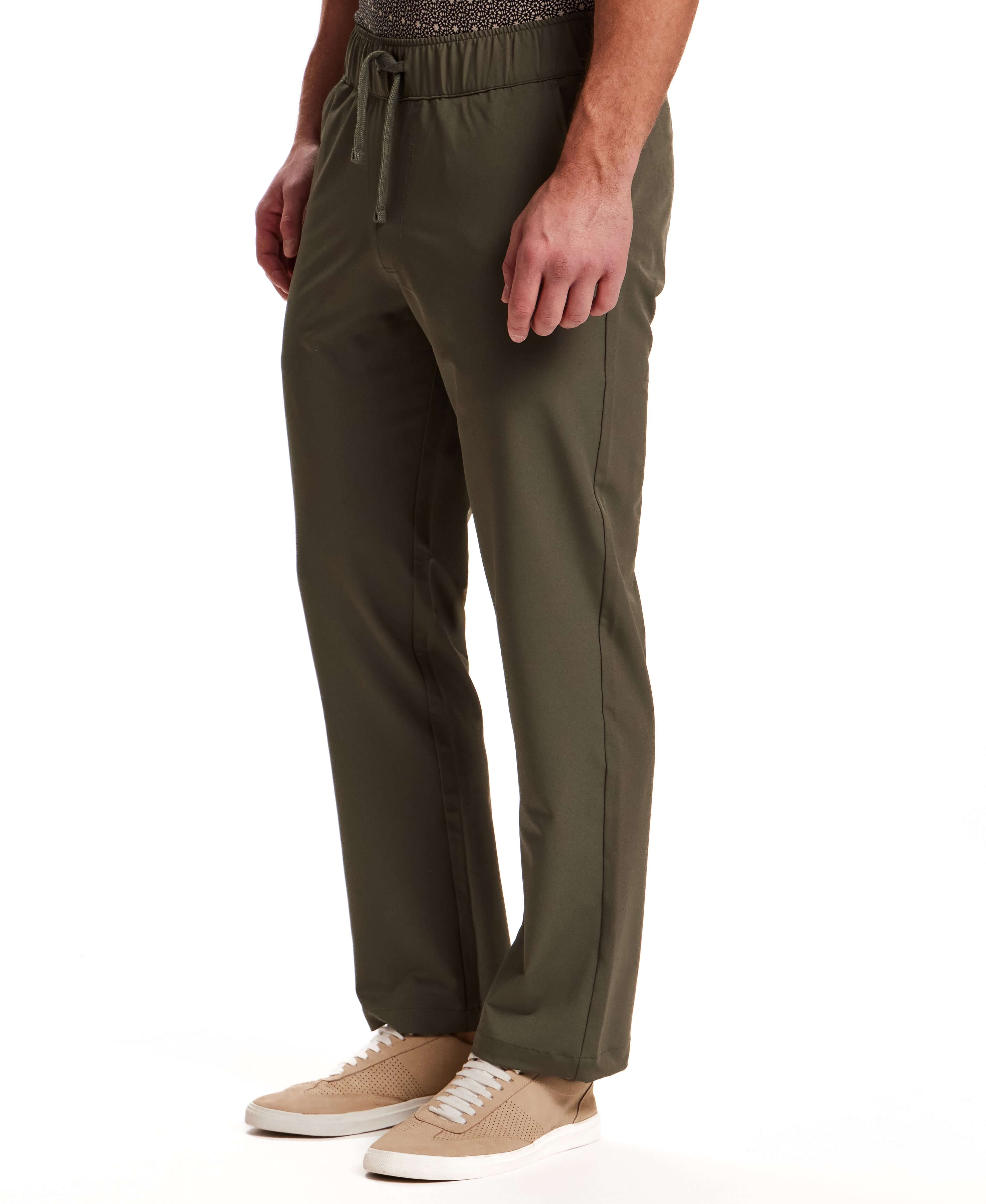 The Tech Jogger in Olive, featuring a smooth stretch blend, elastic waistband, and tailored fit for all-day comfort.
