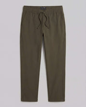 The Tech Jogger in Olive featuring a smooth stretch blend, elastic waistband, and tailored leg design.