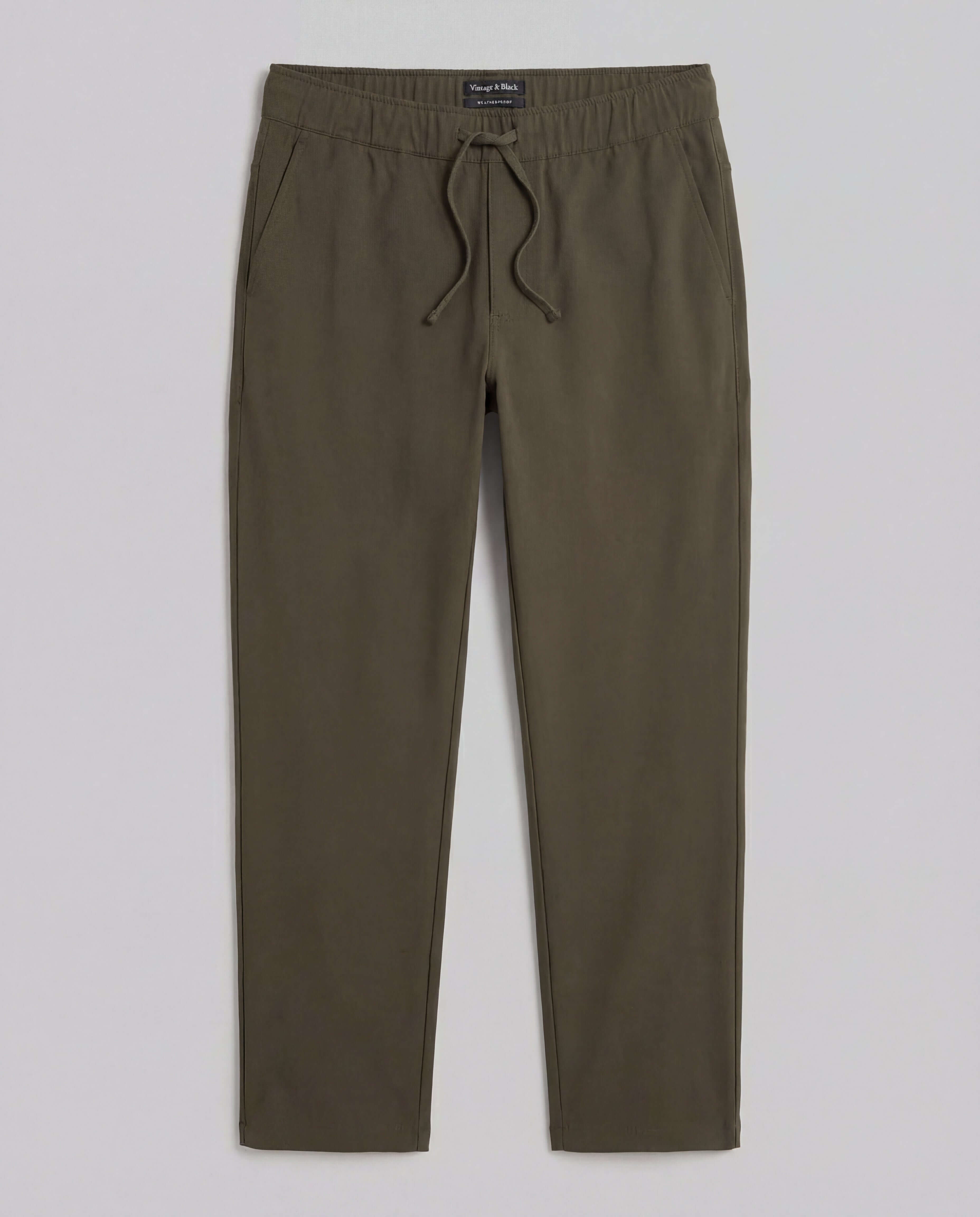 The Tech Jogger in Olive featuring a smooth stretch blend, elastic waistband, and tailored leg design.