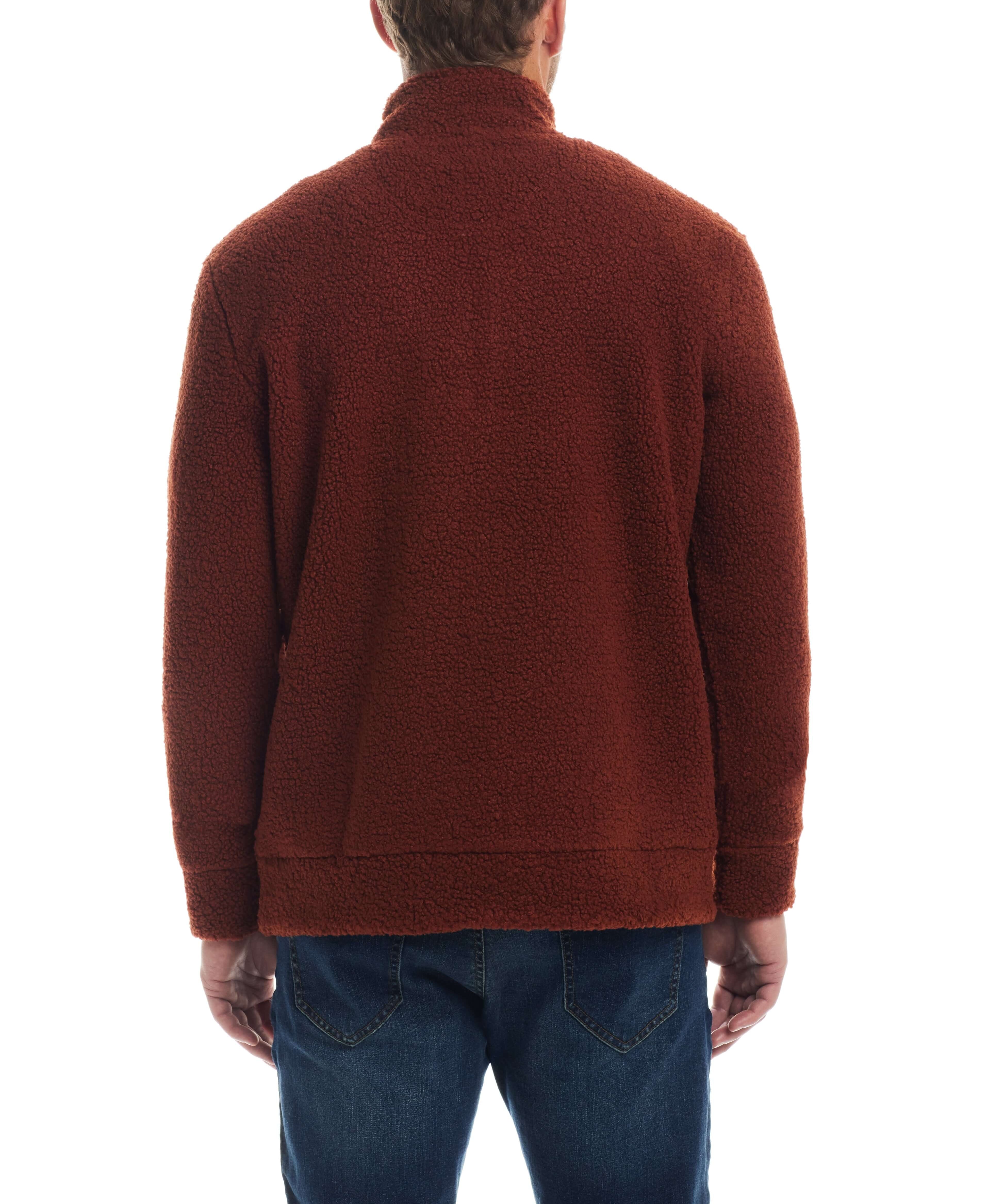 Back view of a cozy teddy sherpa pullover in roasted russet, showcasing plush fleece and quarter-zip design.