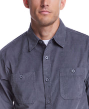 Thin wale solid cord shirt in poppy seed color, featuring a classic button-down collar and two chest pockets.