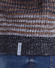 Close-up of Tonal Stripe Crew in natural mix, showcasing textured knit patterns and fabric details.