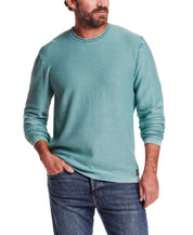 Twill Stonewash Sweater in Adriatic Blue, showcasing a classic roll-neck shape with textured twill knit detail.