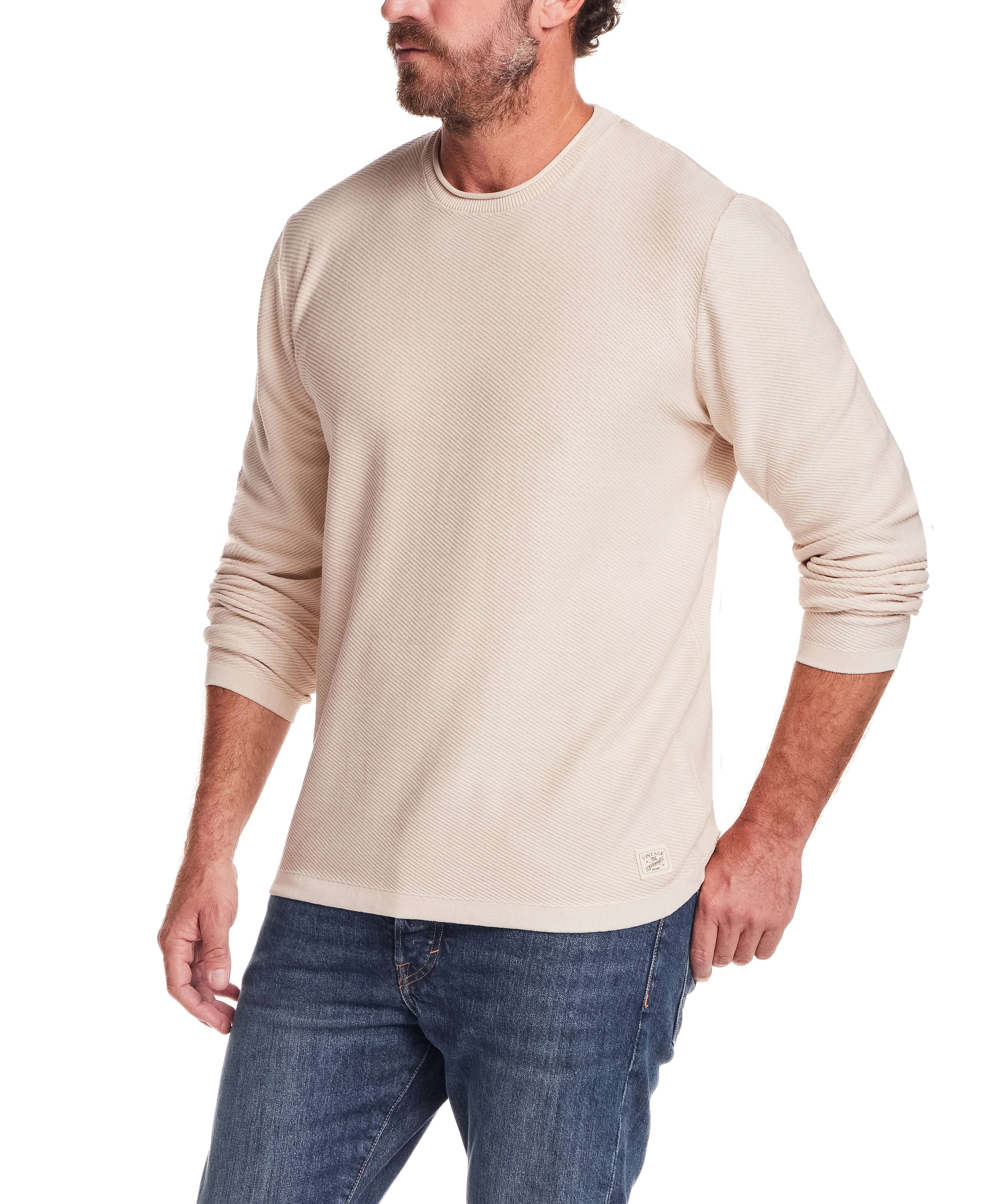 Twill Stonewash Sweater in Natural worn by a man, showcasing the relaxed fit and soft texture.