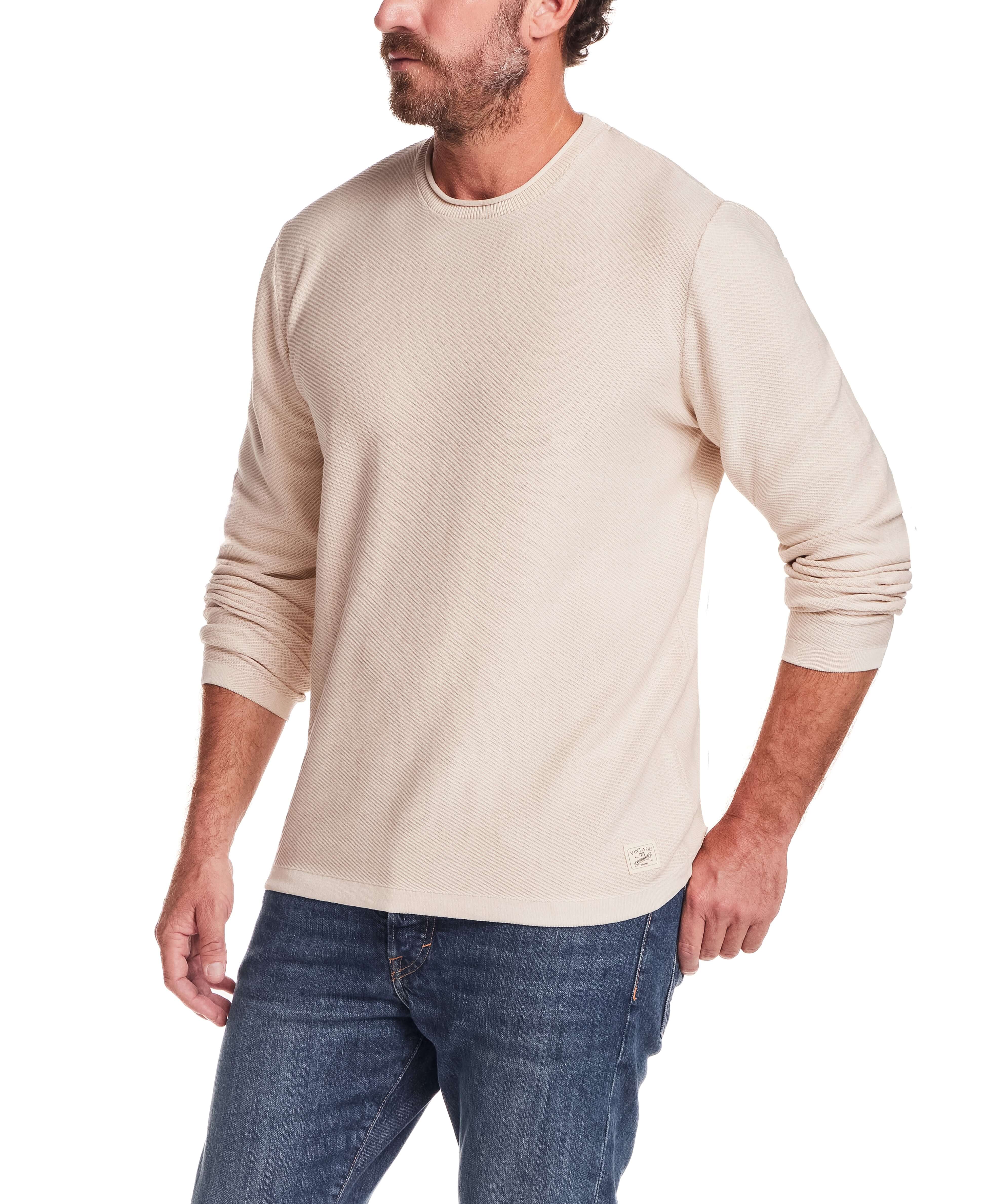 Twill Stonewash Sweater in Natural worn by a man, showcasing the relaxed fit and soft texture.