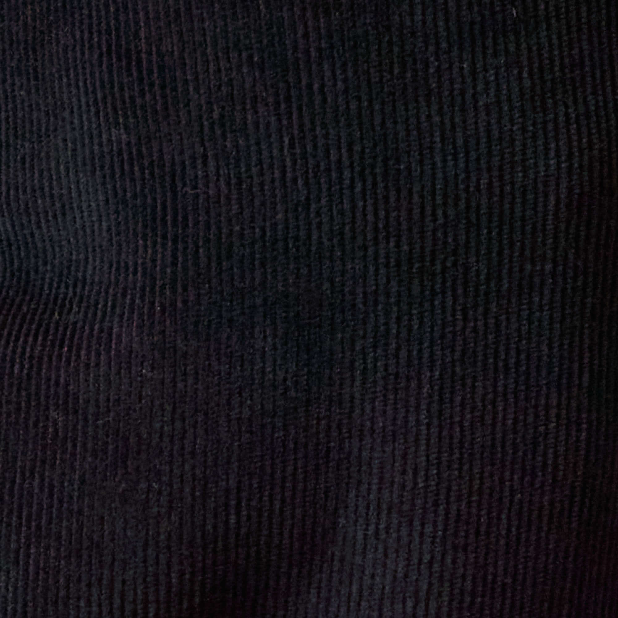 Close-up texture of Two-Tone Cord 5 Pocket Pants in Black showing soft cotton-blend corduroy.