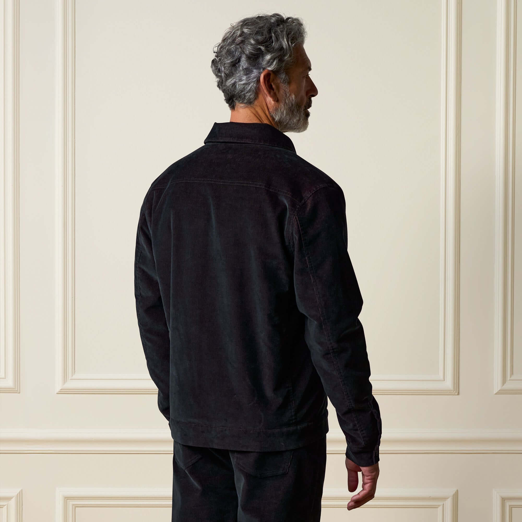 Two-Tone Cord Jacket in Black, back view showcasing rich texture and modern appeal.