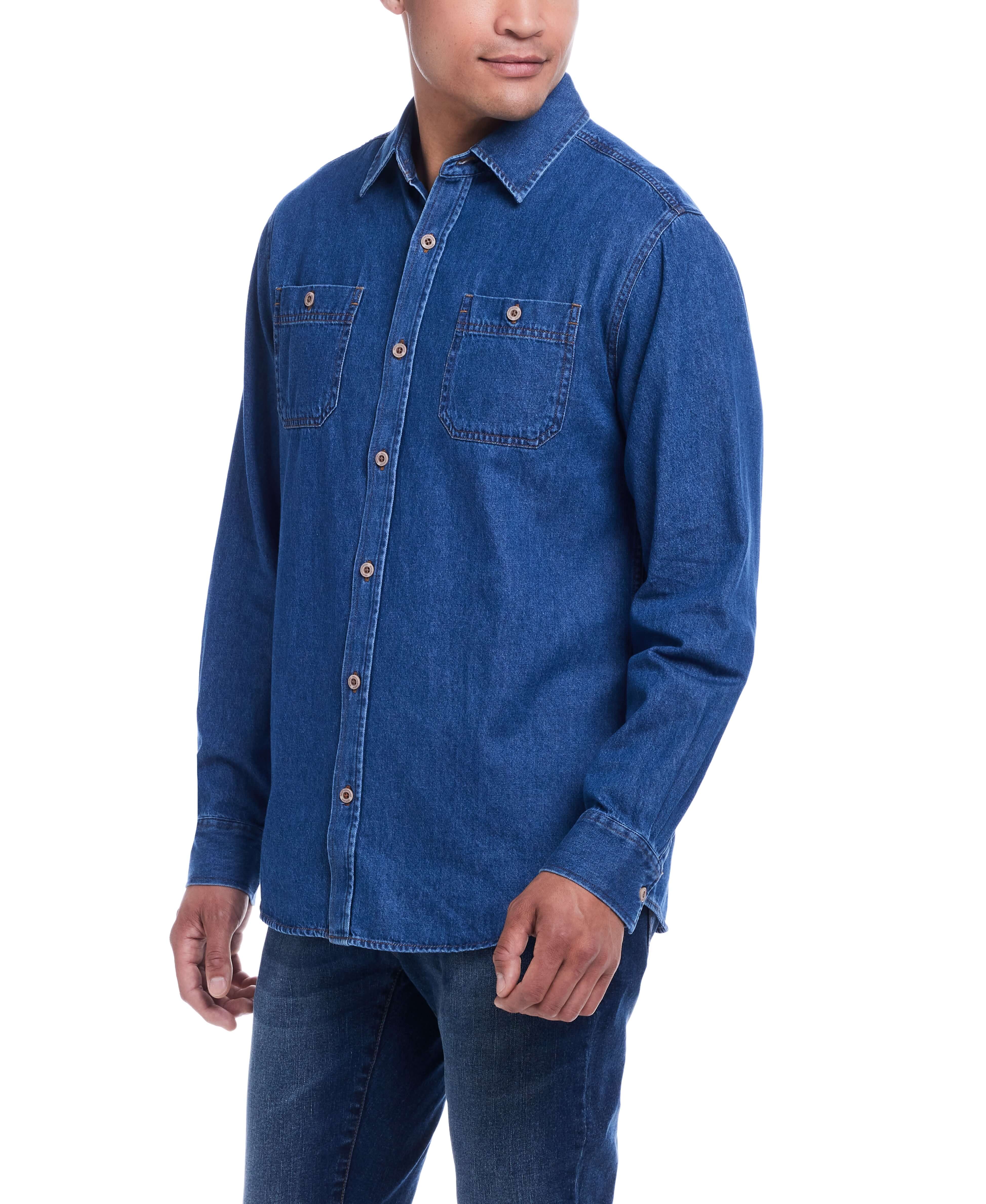 Model wearing a medium indigo unlined denim overshirt, featuring two chest pockets and a stylish, casual look.