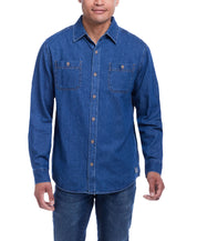 Man wearing a medium indigo unlined denim overshirt with button-up front and two chest pockets.
